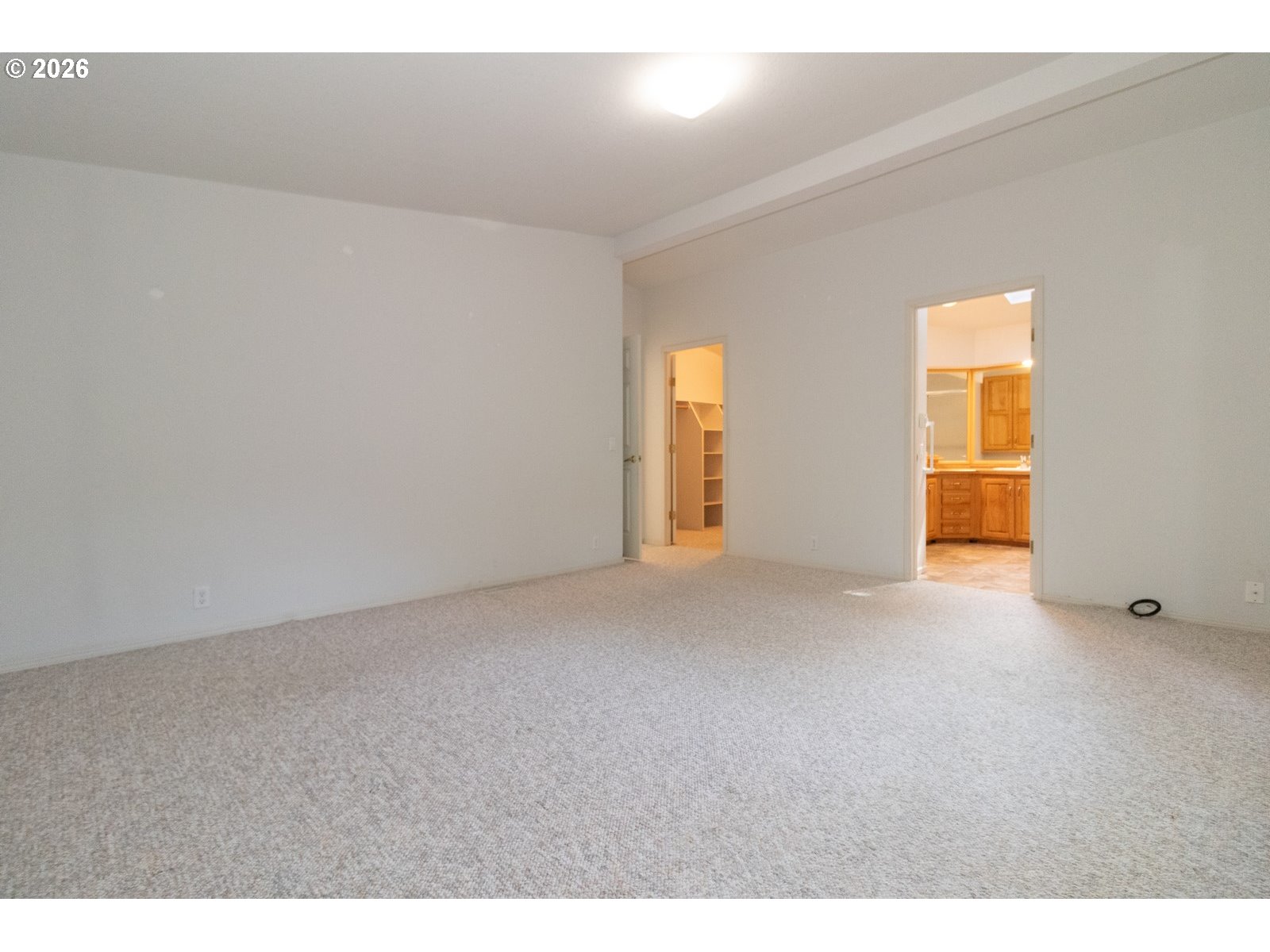 499 Sherwood Loop Florence, OR 97439 - Photo 22 of 39 a view of an empty room with a window