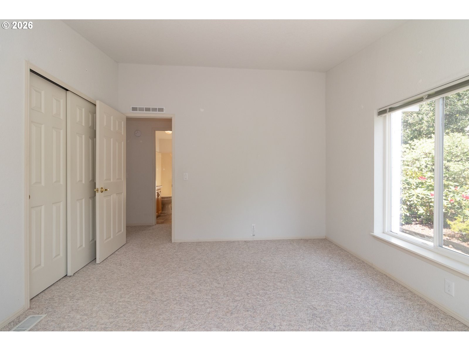 499 Sherwood Loop Florence, OR 97439 - Photo 28 of 39 a view of an empty room with a window
