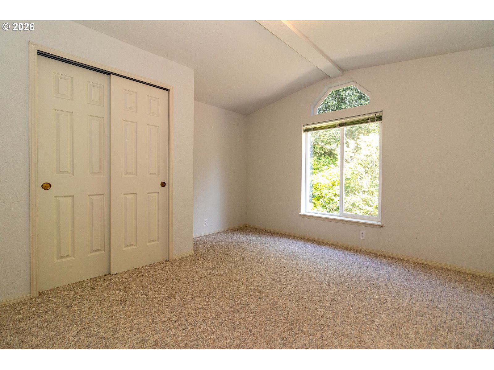 499 Sherwood Loop Florence, OR 97439 - Photo 32 of 39 a view of an empty room with a window