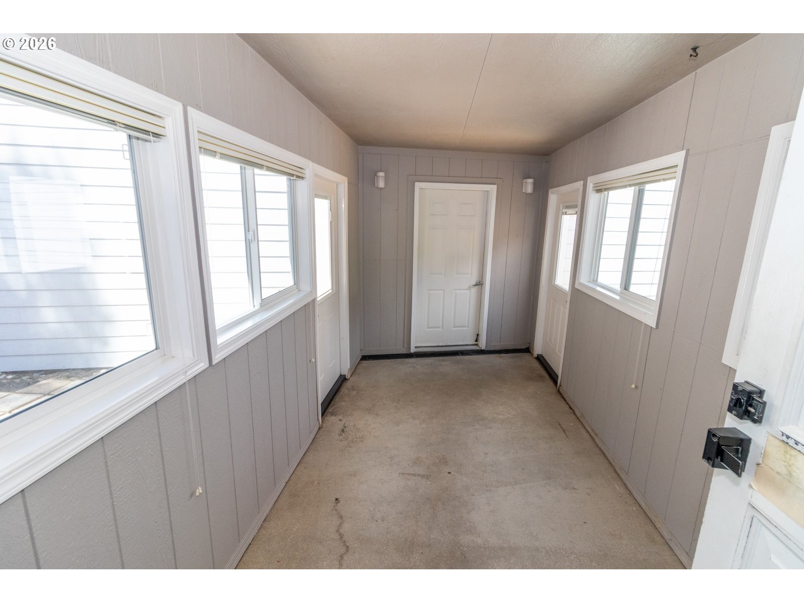 499 Sherwood Loop Florence, OR 97439 - Photo 35 of 39 a view of an empty room with a window