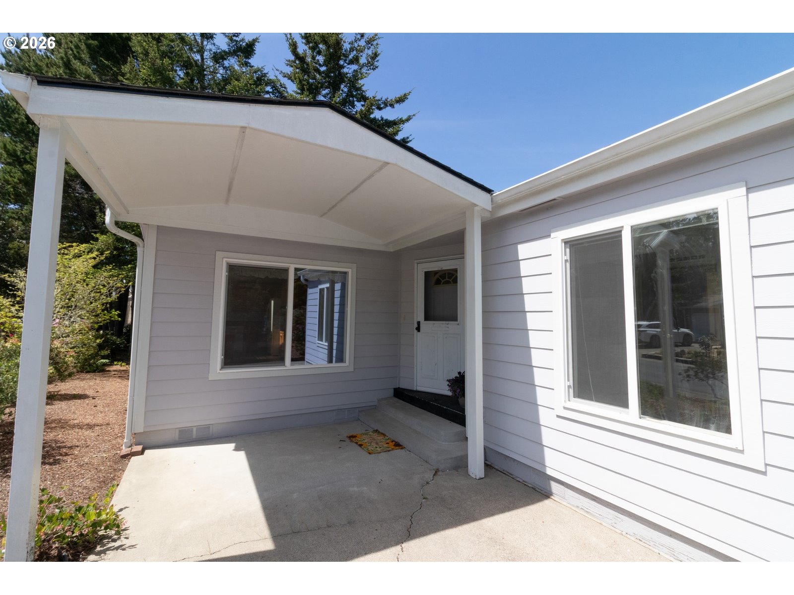 499 Sherwood Loop Florence, OR 97439 - Photo 8 of 39 a house view with a outdoor space