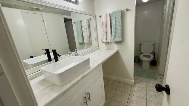 a utility room with washer and dryer