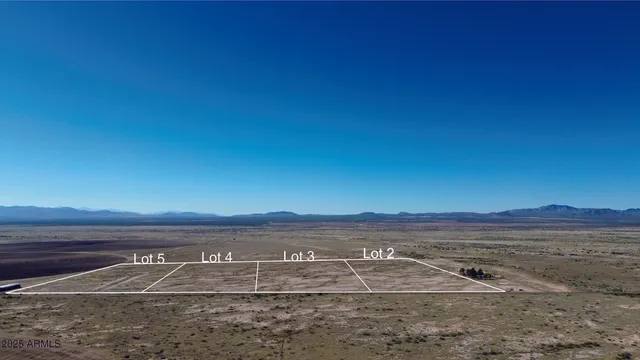 a view of ocean view with large trees