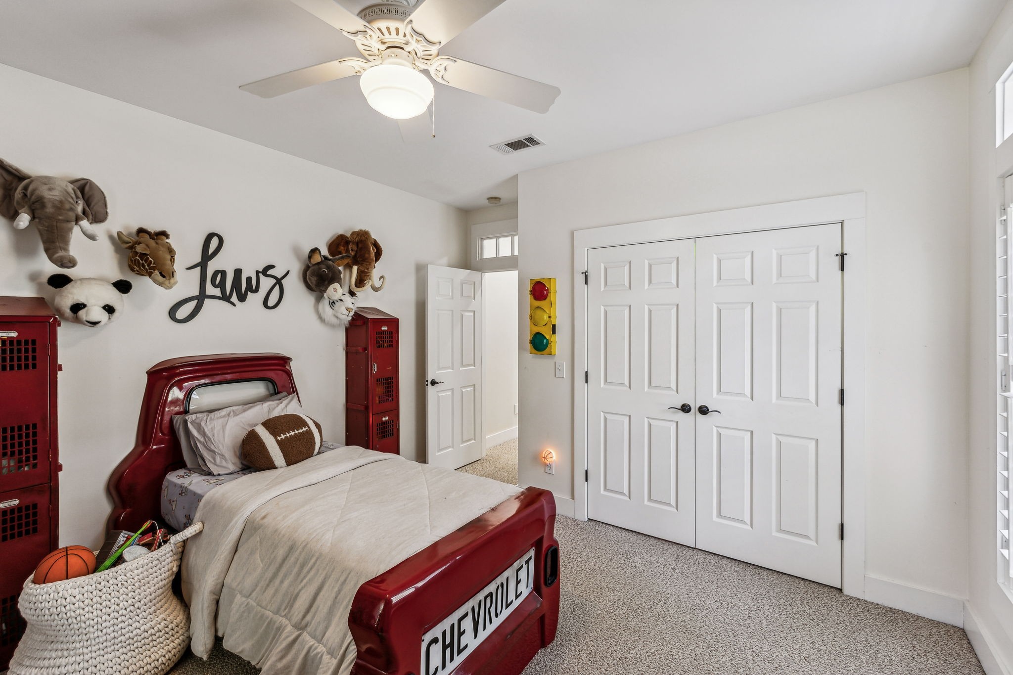 10795 Threet Road Christiana, TN 37037 - Photo 29 of 37 a bedroom with a bed and a chandelier