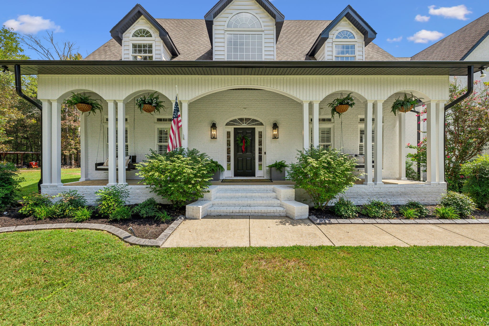 10795 Threet Road Christiana, TN 37037 - Photo 3 of 37 front view of a house with a garden