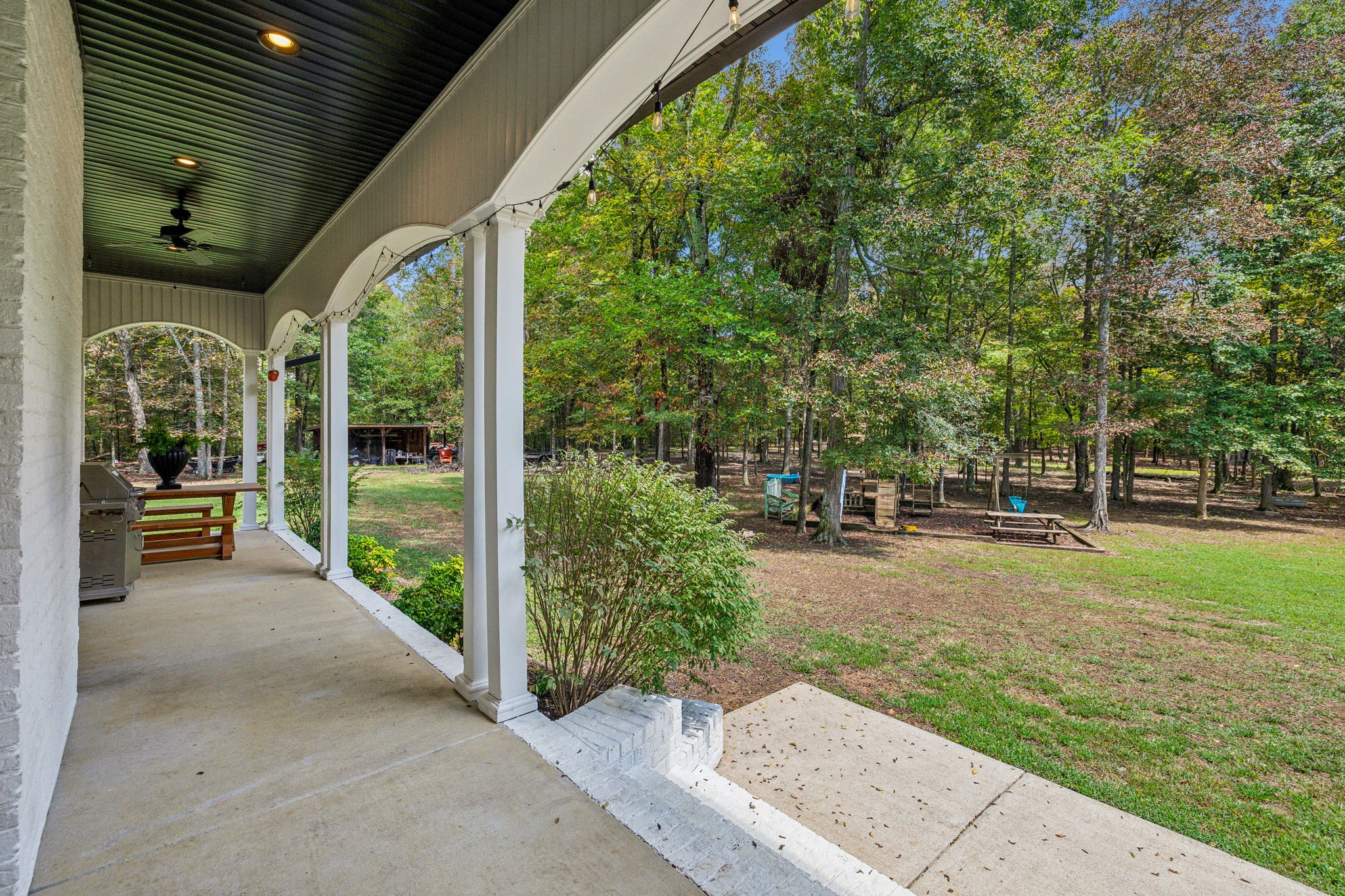 10795 Threet Road Christiana, TN 37037 - Photo 33 of 37 a view of a garden with patio