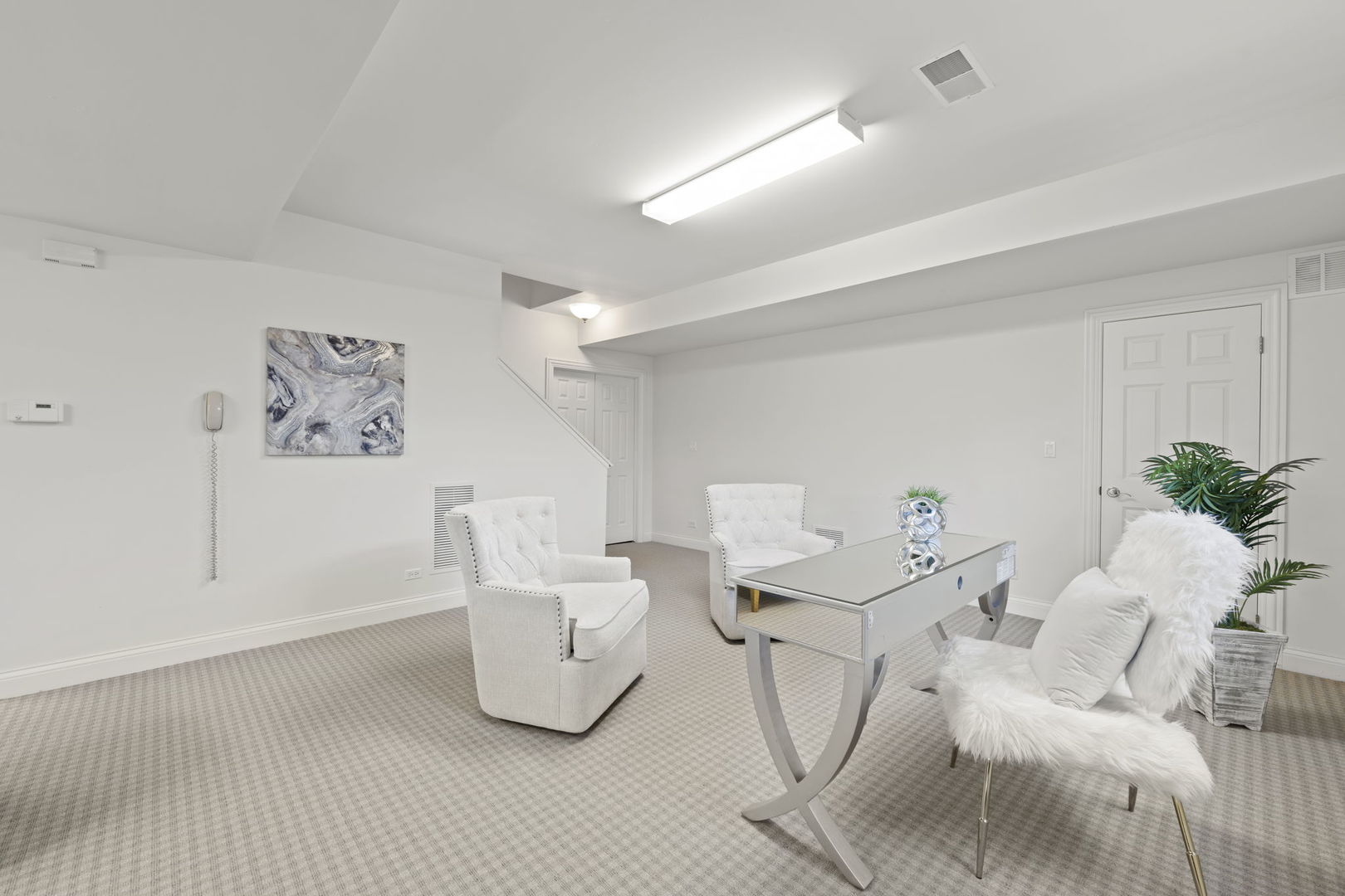 9 Forest Gate Circle Oak Brook, IL 60523 - Photo 23 of 39 a living room with furniture and a potted plant