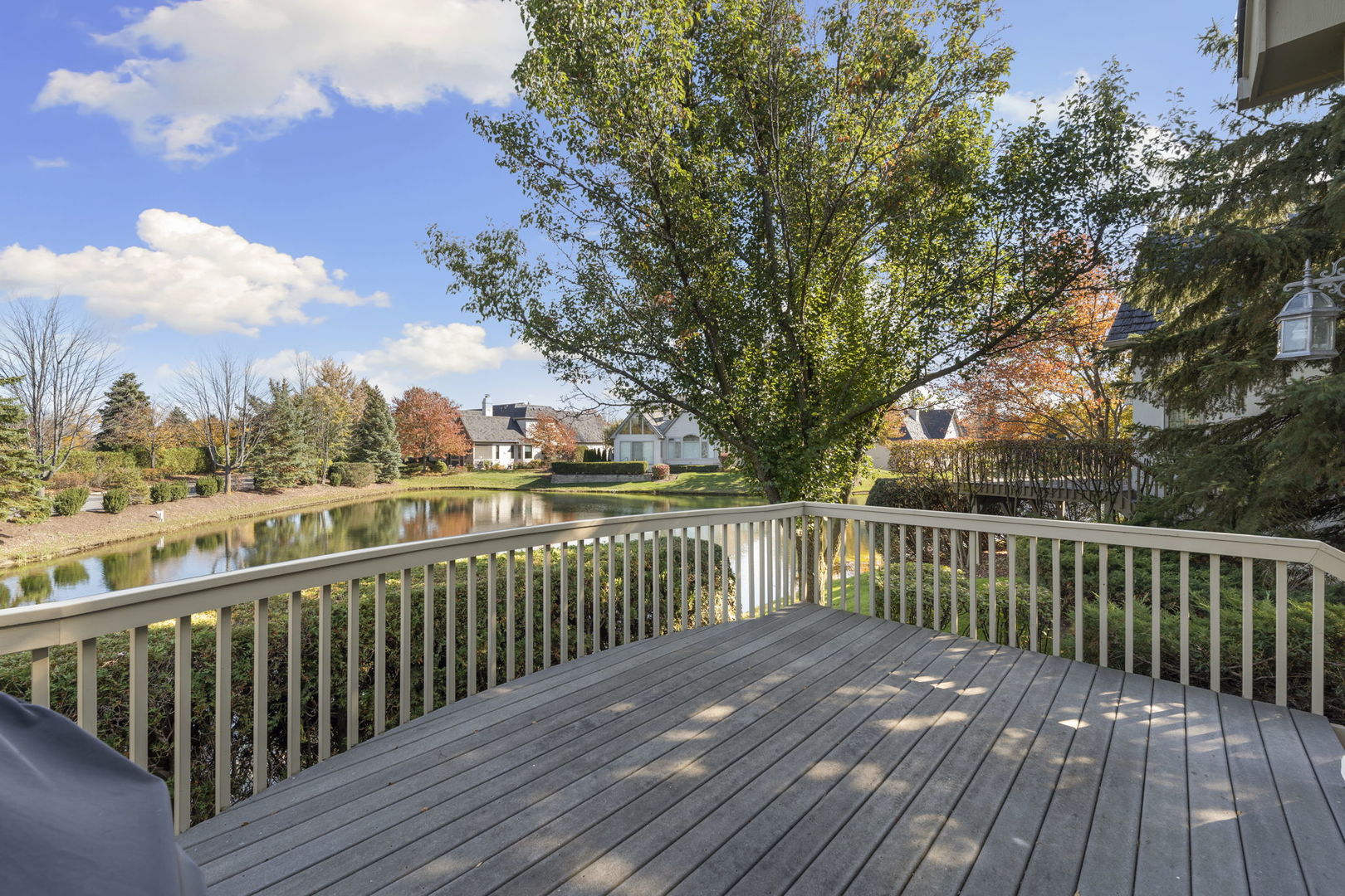 9 Forest Gate Circle Oak Brook, IL 60523 - Photo 29 of 39 a view of deck with wooden floor and fence