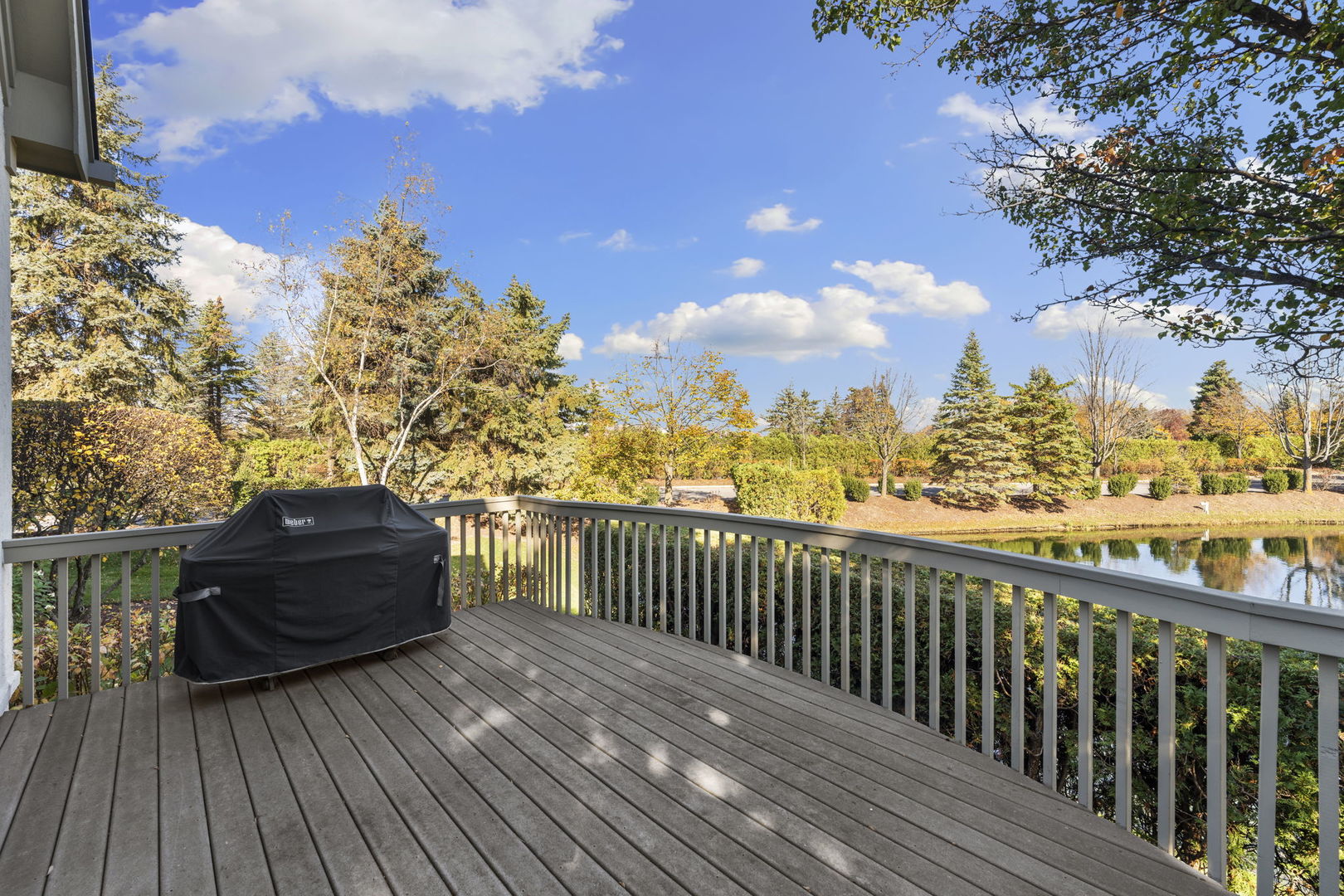 9 Forest Gate Circle Oak Brook, IL 60523 - Photo 30 of 39 a view of a balcony with wooden floor