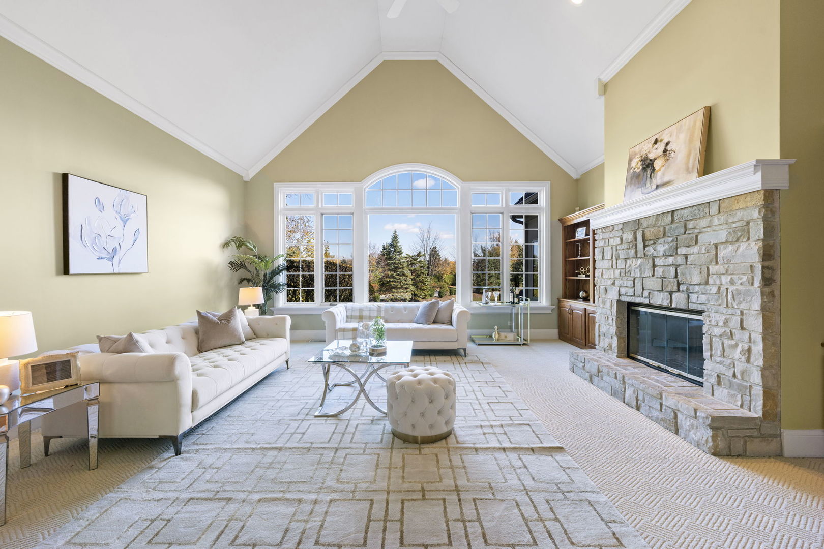 9 Forest Gate Circle Oak Brook, IL 60523 - Photo 4 of 39 a living room with furniture large window and a fireplace