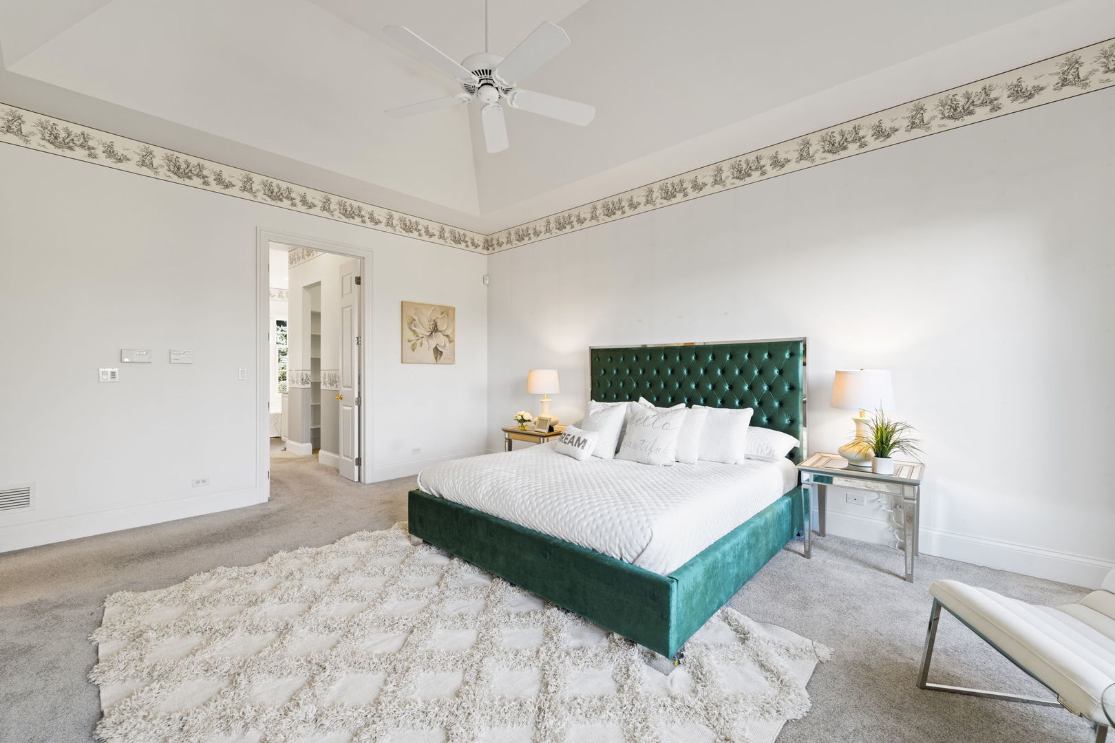 9 Forest Gate Circle Oak Brook, IL 60523 - Photo 9 of 39 a spacious bedroom with a bed and a table in it