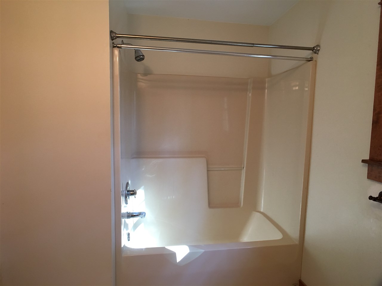 278 Jordan Store Road Kents Store, VA 23084 - Photo 36 of 47 a bathroom with a glass shower door