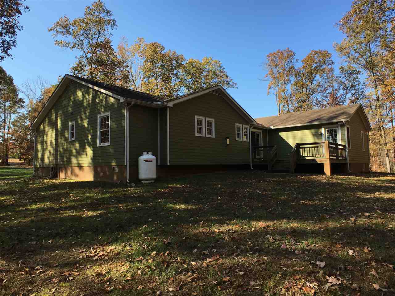 278 Jordan Store Road Kents Store, VA 23084 - Photo 8 of 47 a front view of a house with a yard and garage