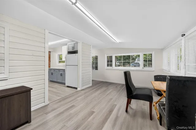 a view of a livingroom with furniture and window