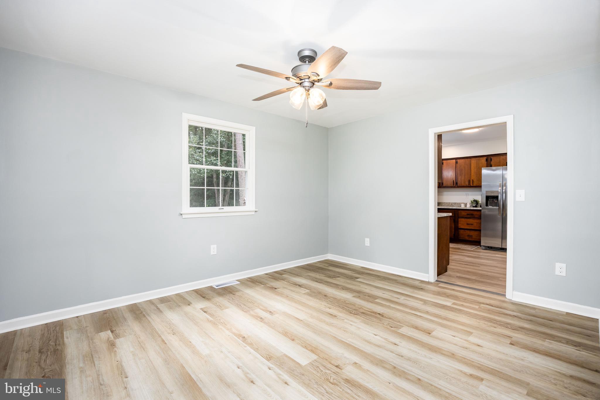 31939 Downing Road Delmar, MD 21875 - Photo 13 of 45 wooden floor in an empty room with a window
