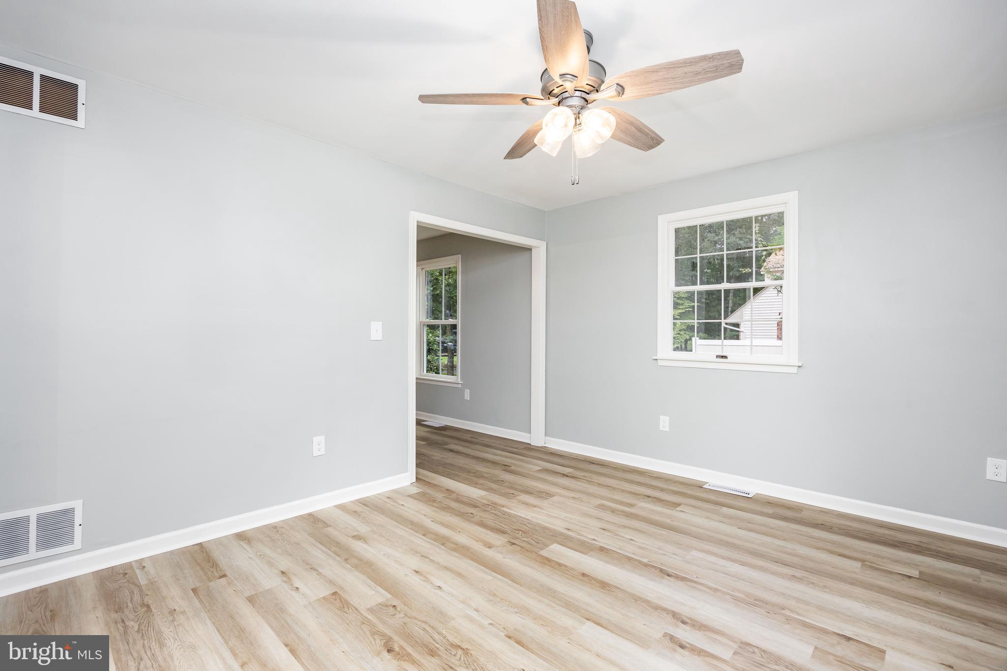 31939 Downing Road Delmar, MD 21875 - Photo 14 of 45 wooden floor in an empty room with a window
