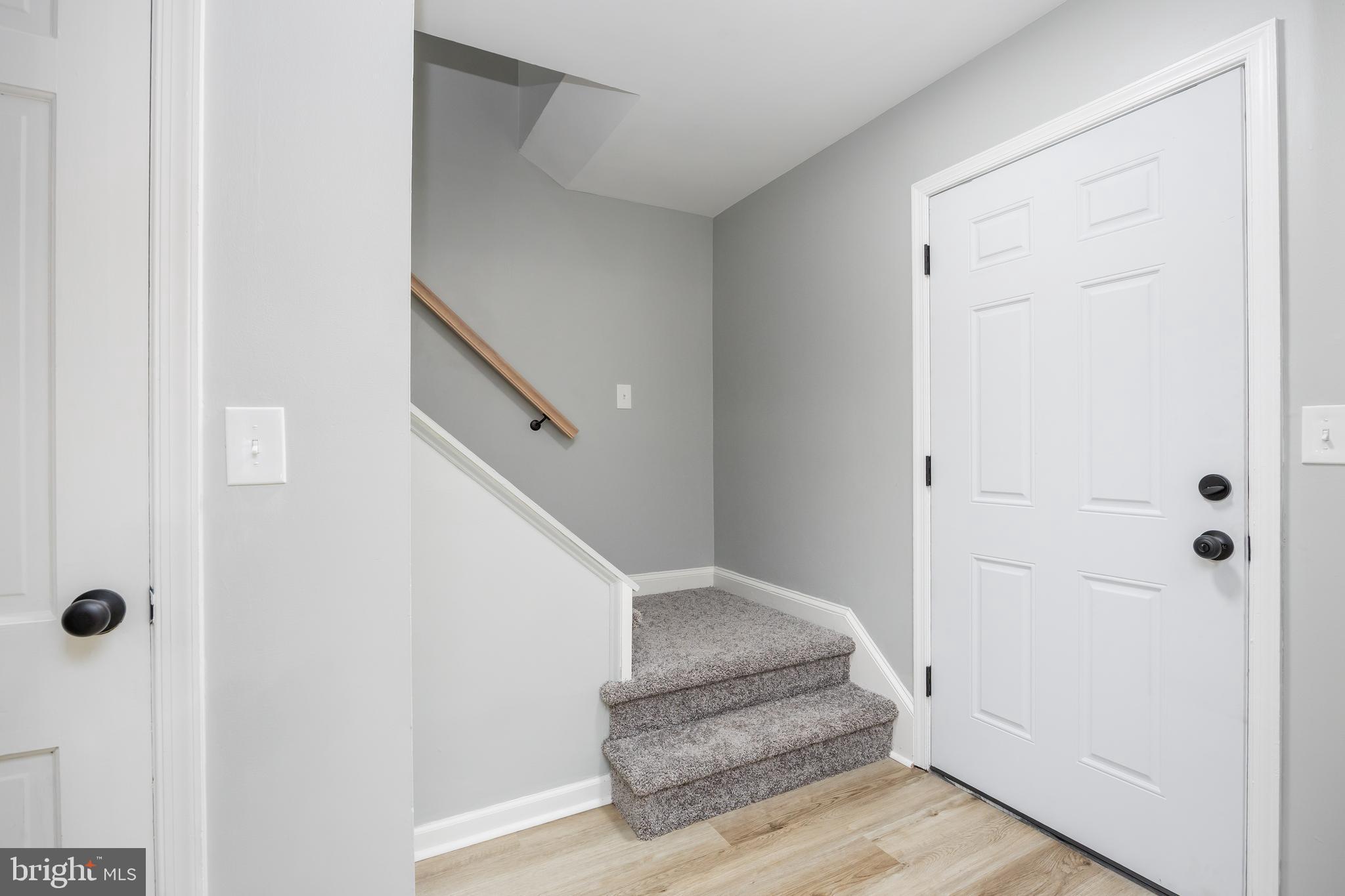 31939 Downing Road Delmar, MD 21875 - Photo 19 of 45 a view of a hallway with staircase