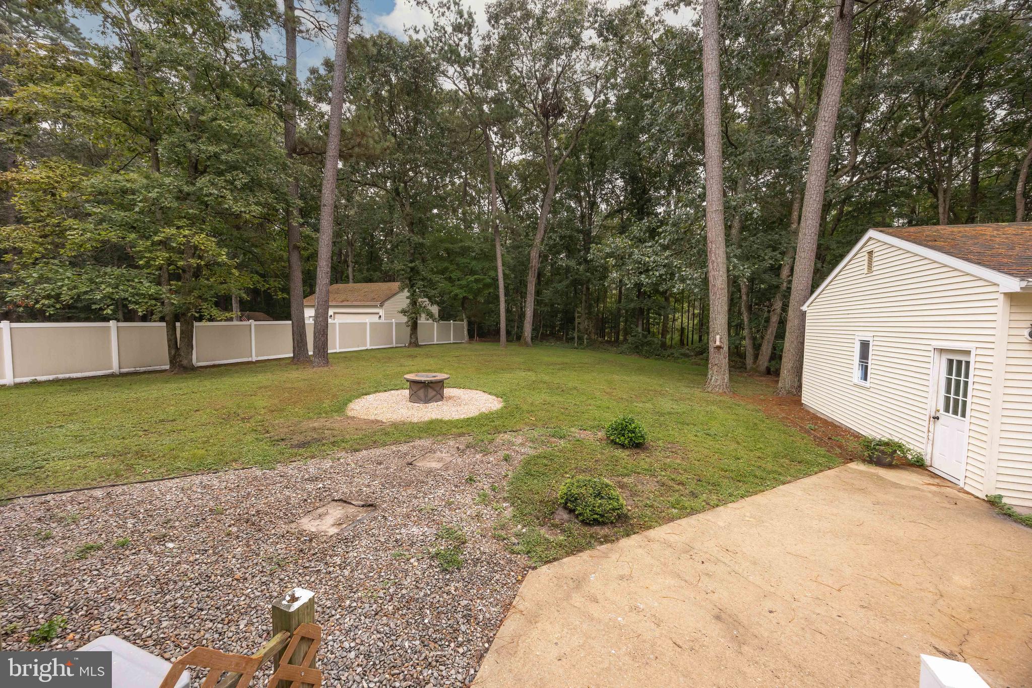 31939 Downing Road Delmar, MD 21875 - Photo 38 of 45 a view of a backyard with a small cabin