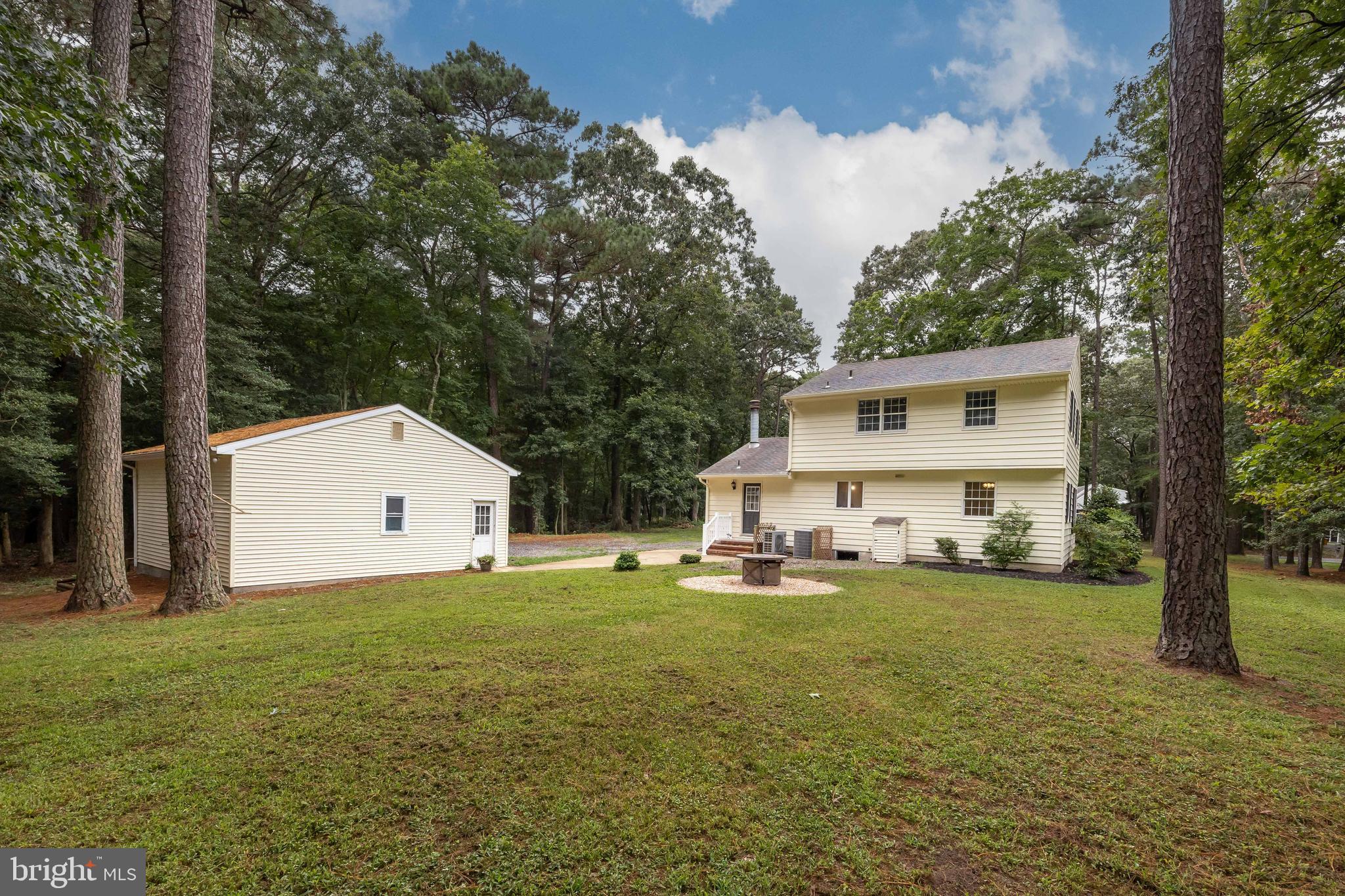 31939 Downing Road Delmar, MD 21875 - Photo 42 of 45 a view of a house with a yard