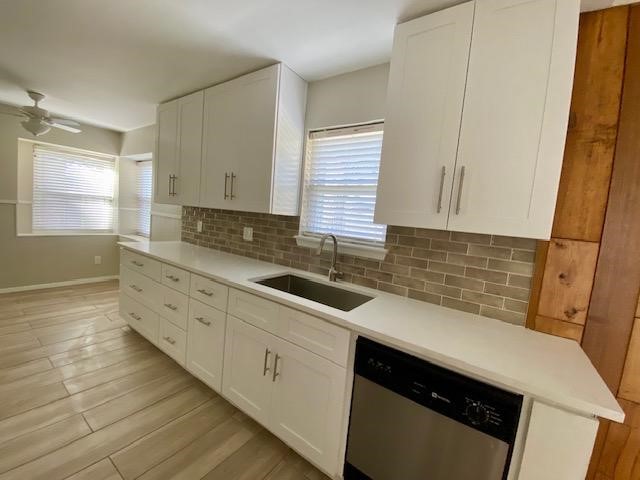 6002 Effingham Drive Houston, TX 77035 - Photo 9 of 22 a kitchen with a sink and cabinets
