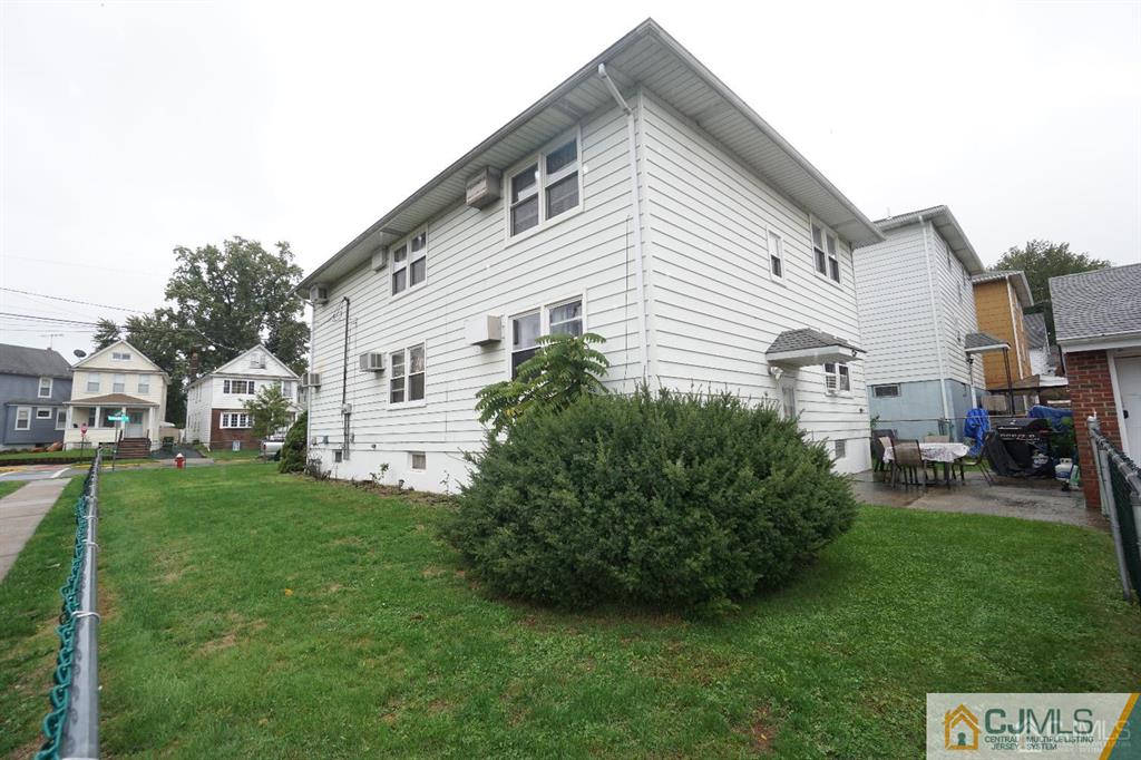 400 Washington Avenue Linden, NJ 07036 - Photo 17 of 18 a view of a house with a backyard
