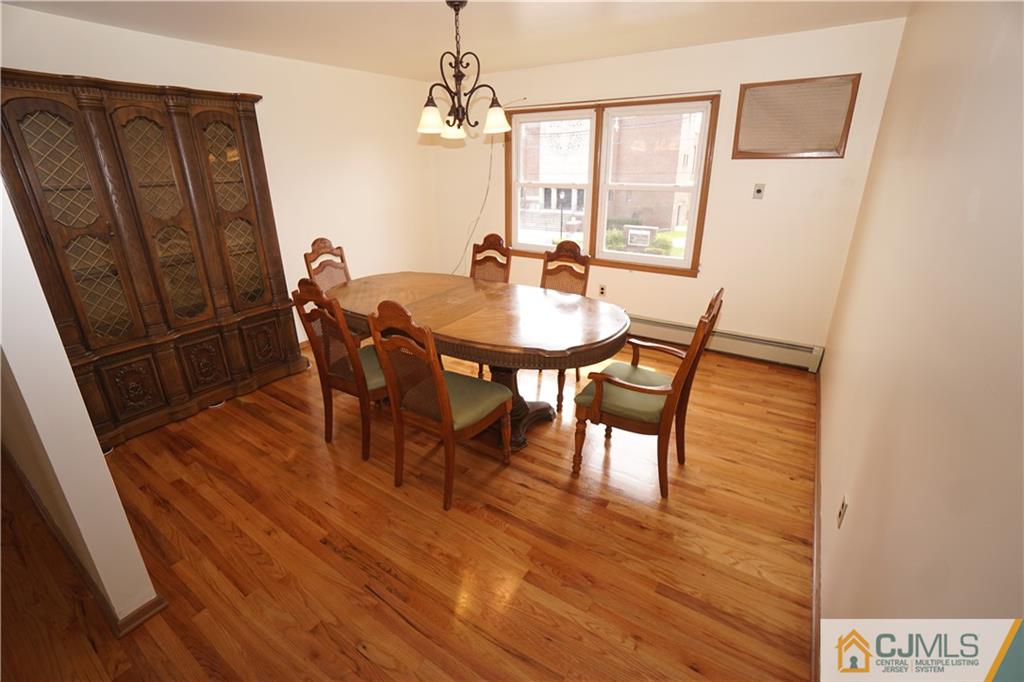 400 Washington Avenue Linden, NJ 07036 - Photo 8 of 18 a view of a dining room with furniture and window