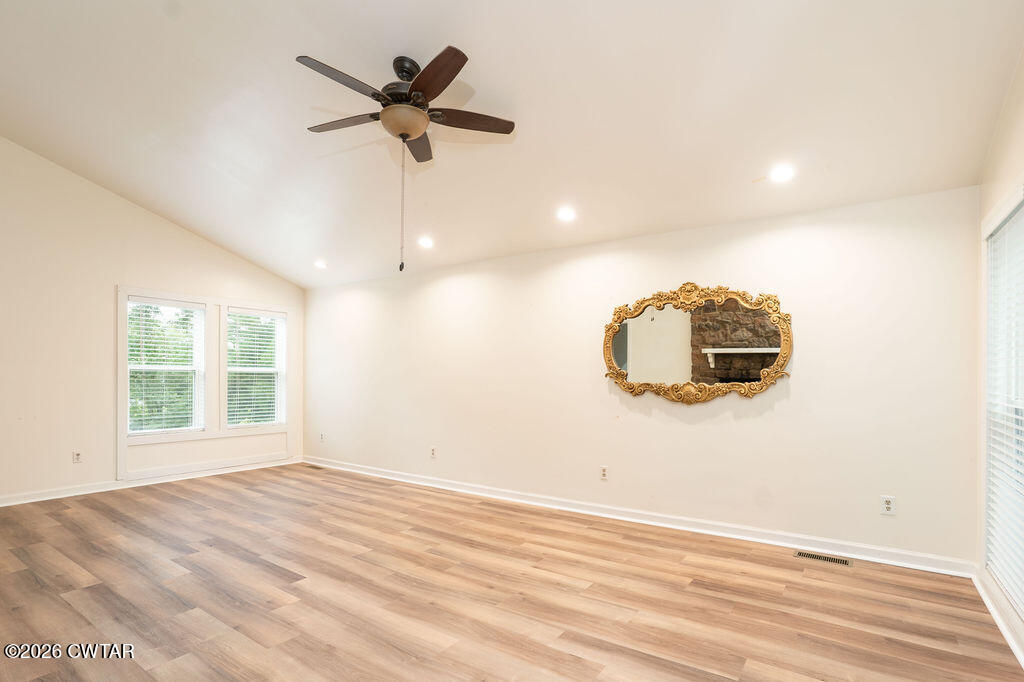 7 Timberlake Drive Jackson, TN 38305 - Photo 7 of 38 a view of a room with a ceiling fan and a window