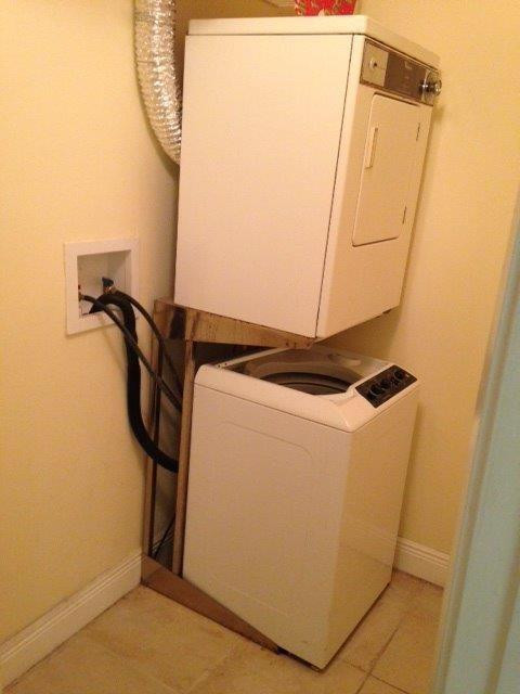 4221 West McNab Road, Unit 29 Pompano Beach, FL 33069 - Photo 12 of 15 a utility room with dryer and washer