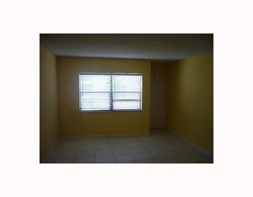 303 Racquet Club Road, Unit 204 Weston, FL 33326 - Photo 7 of 8 Master Bedroom