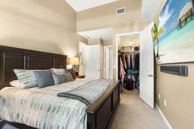 a bathroom with a double vanity sink mirror and toilet