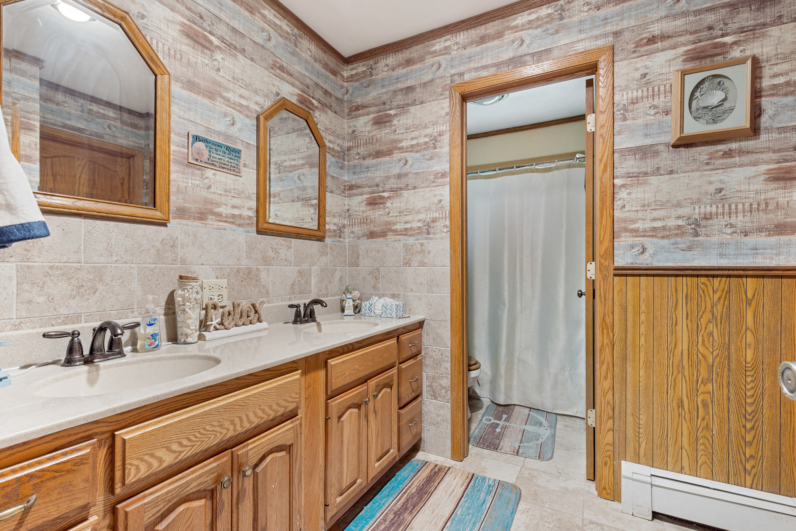 1229 Crest Lane Rochelle, IL 61068 - Photo 11 of 30 a bathroom with a sink and a mirror