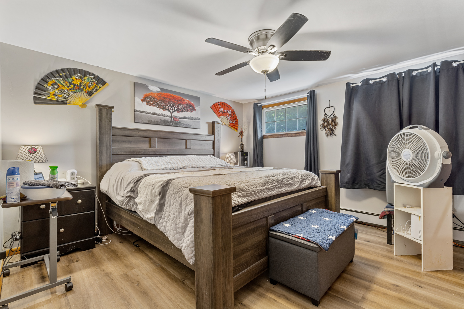 1229 Crest Lane Rochelle, IL 61068 - Photo 14 of 30 a bedroom with a bed and a chandelier