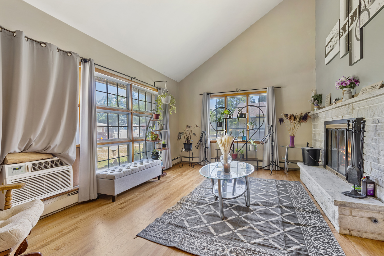 1229 Crest Lane Rochelle, IL 61068 - Photo 2 of 30 a living room with furniture and a floor to ceiling window