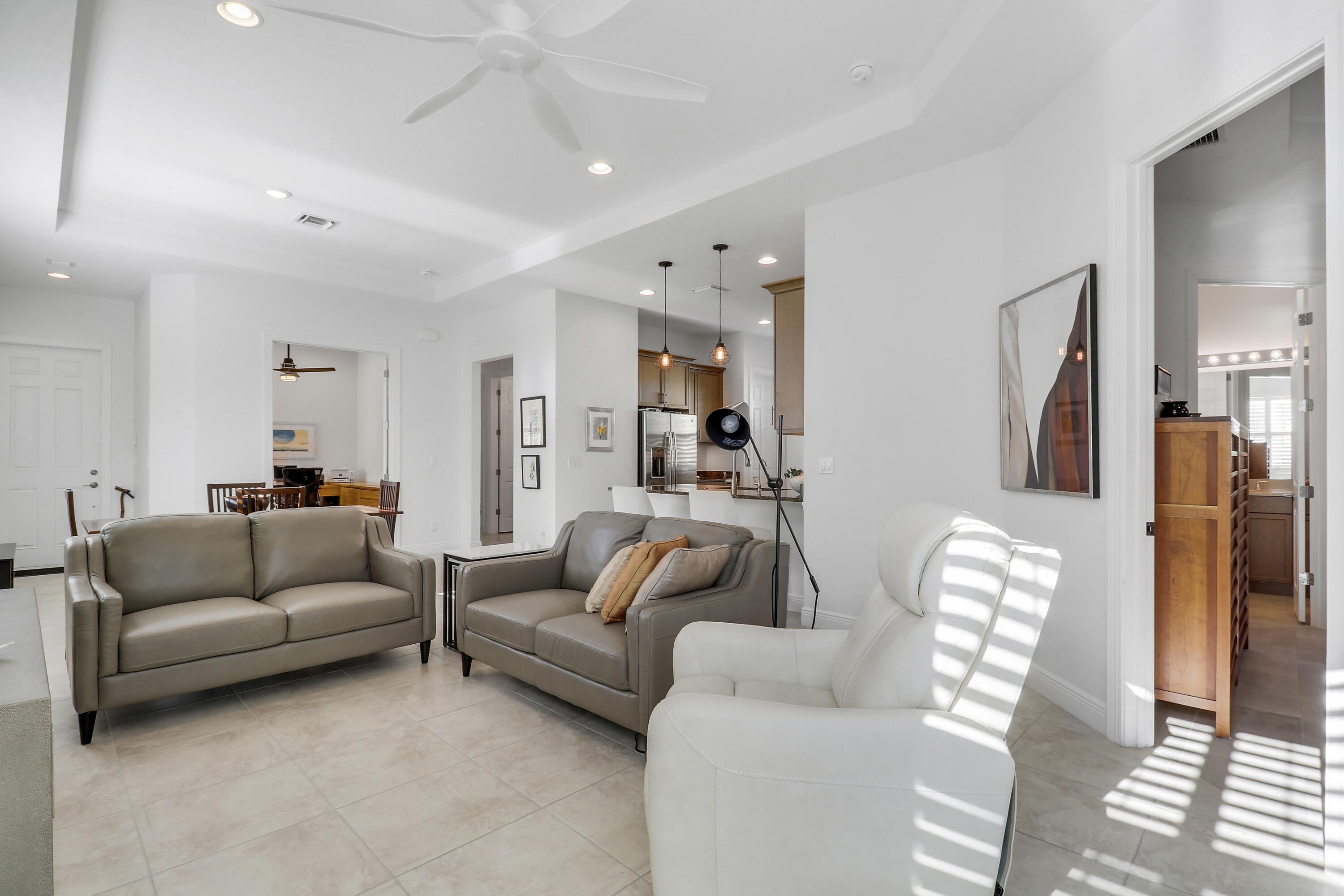 11215 Southwest Visconti Way Port St. Lucie, FL 34986 - Photo 11 of 61 a living room with furniture and a large window