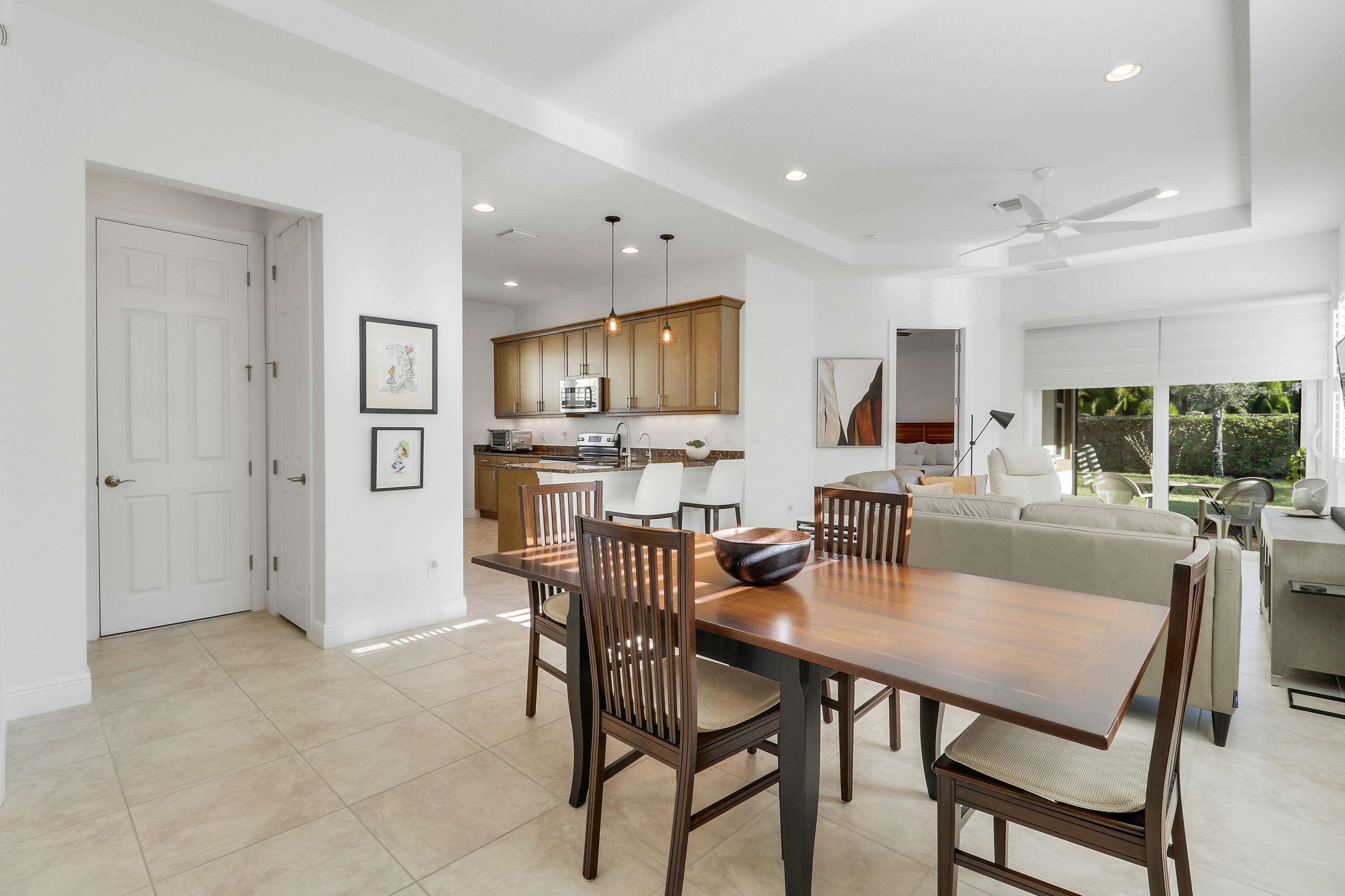 11215 Southwest Visconti Way Port St. Lucie, FL 34986 - Photo 4 of 61 a view of a dining room with furniture