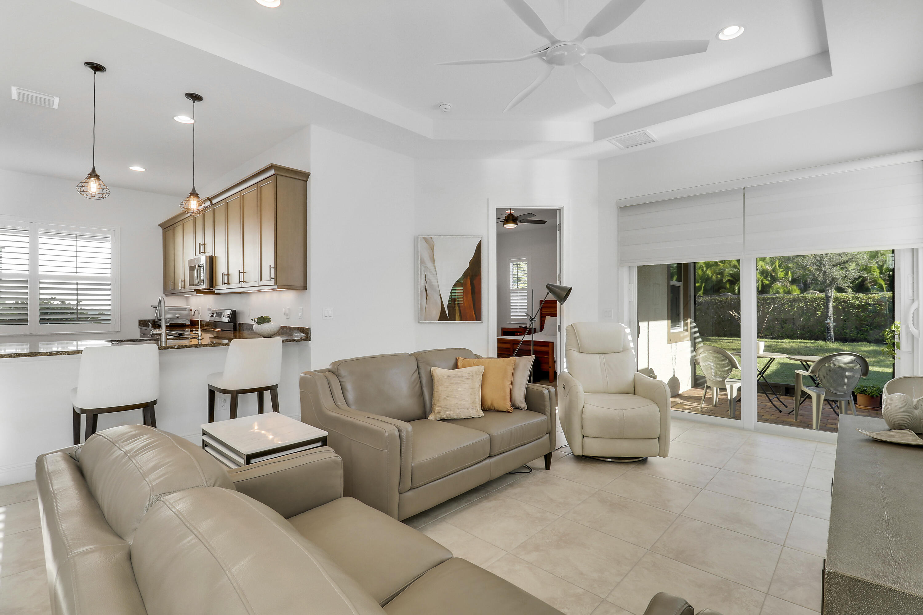 11215 Southwest Visconti Way Port St. Lucie, FL 34986 - Photo 7 of 61 a living room with furniture and a large window