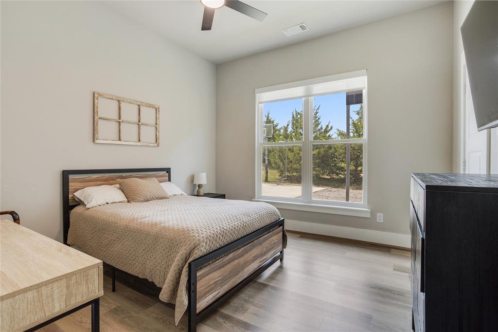 1095 Sister Grove Road Van Alstyne, TX 75495 - Photo 20 of 35 One of the secondary bedrooms 12x12. Has a walk-in closet.