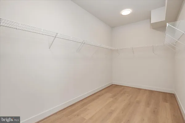 a view of a room with racks on the wall