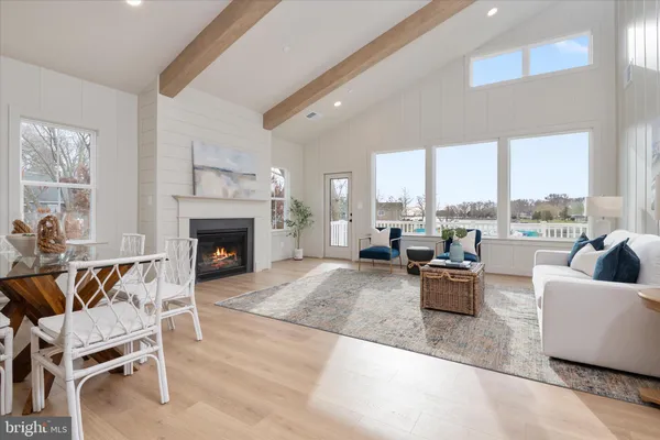 a living room with furniture and a lamp