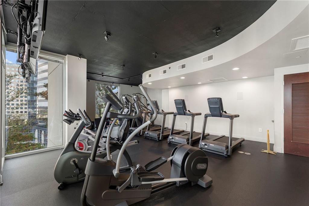 3324 Peachtree Road Northeast, Unit 2804 Atlanta, GA 30326 - Photo 16 of 32 a view of a room with gym equipment
