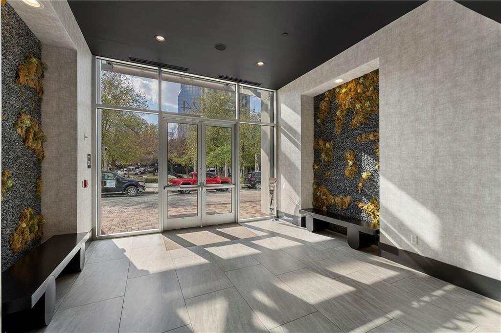 3324 Peachtree Road Northeast, Unit 2804 Atlanta, GA 30326 - Photo 20 of 32 a bathroom with a tub shower and window