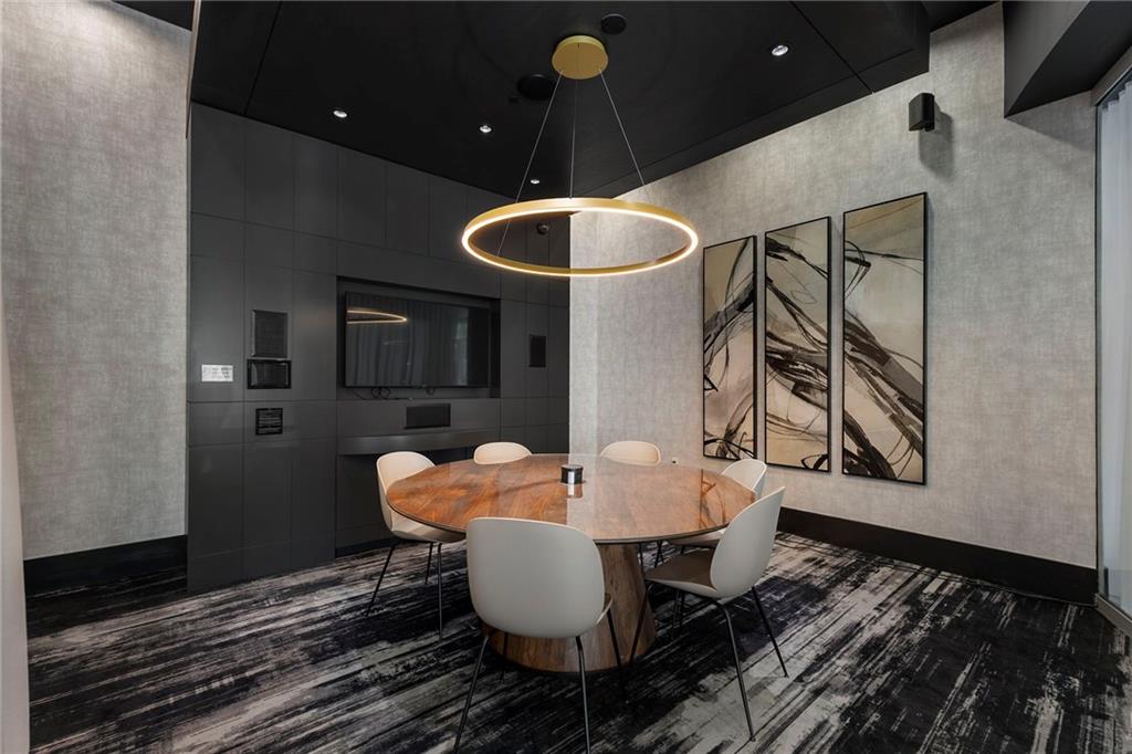 3324 Peachtree Road Northeast, Unit 2804 Atlanta, GA 30326 - Photo 21 of 32 a dining room with furniture and wooden floor