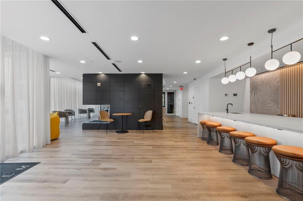 3324 Peachtree Road Northeast, Unit 2804 Atlanta, GA 30326 - Photo 29 of 32 a large kitchen with lots of counter space and stainless steel appliances