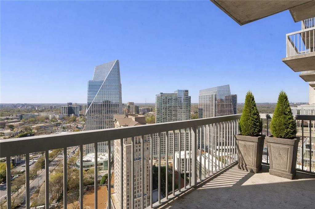 3324 Peachtree Road Northeast, Unit 2804 Atlanta, GA 30326 - Photo 10 of 34 a view of a city skyline from a balcony