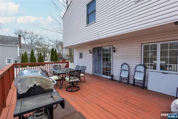 a view of a balcony with furniture