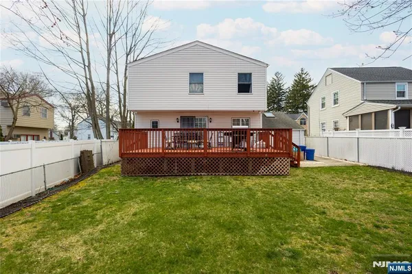 a view of front of house with a yard