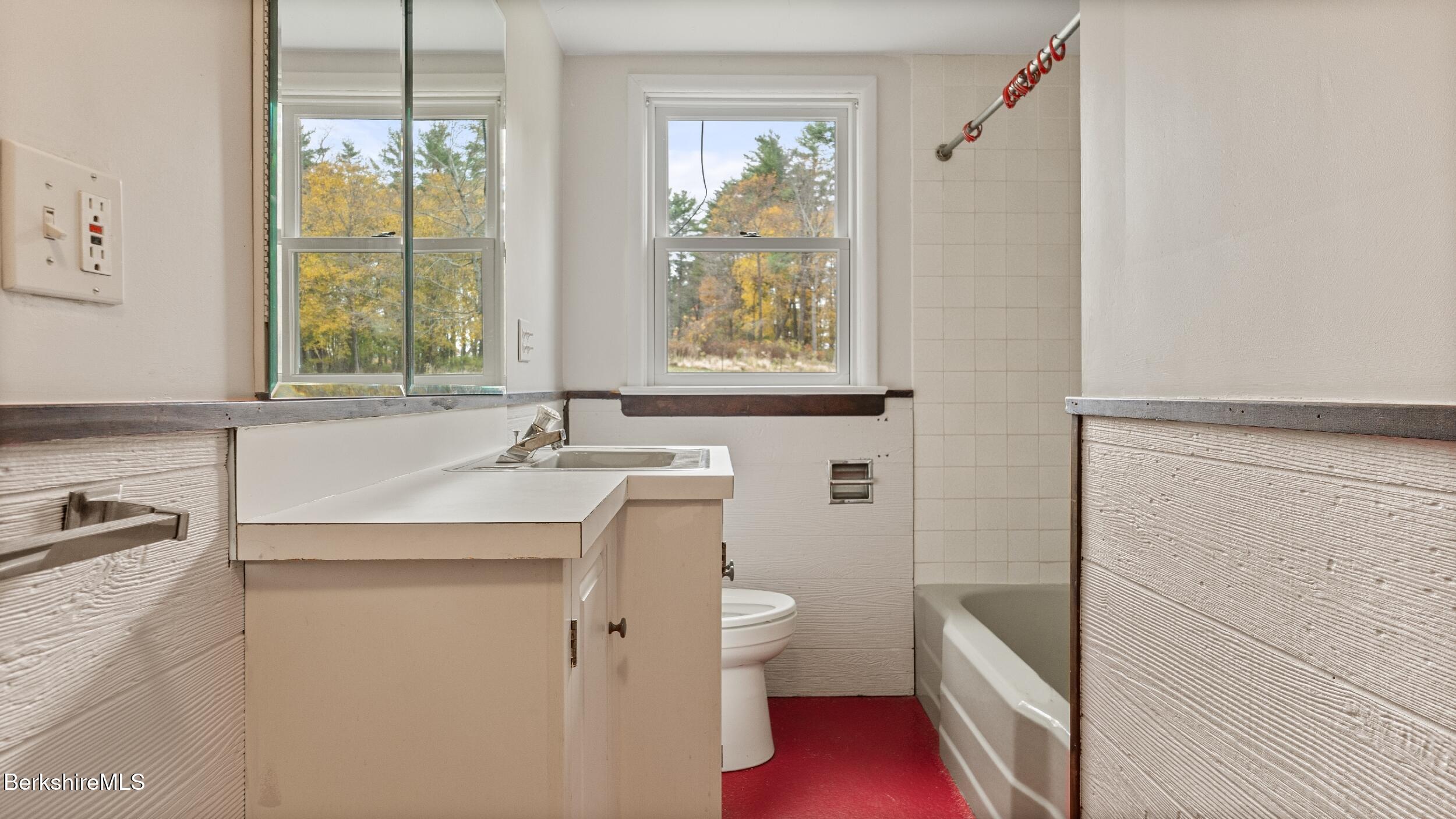 3 Pleasant View Drive Great Barrington, MA 01230 - Photo 22 of 28 a bathroom with a sink a toilet and a window