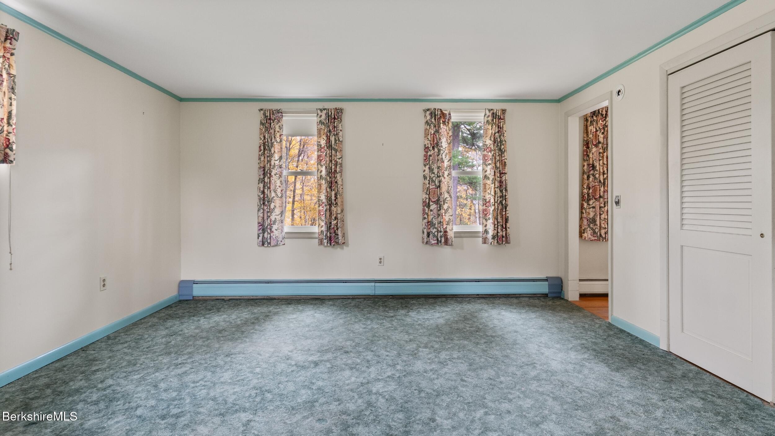 3 Pleasant View Drive Great Barrington, MA 01230 - Photo 8 of 28 an empty room with windows