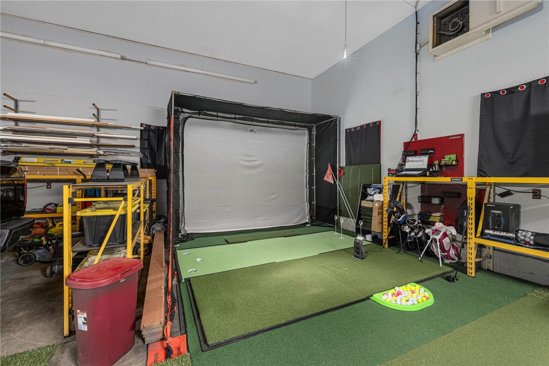 365 West Wrentham Road Cumberland, RI 02864 - Photo 45 of 50 Gold simulator set up in garage. Negotiable.