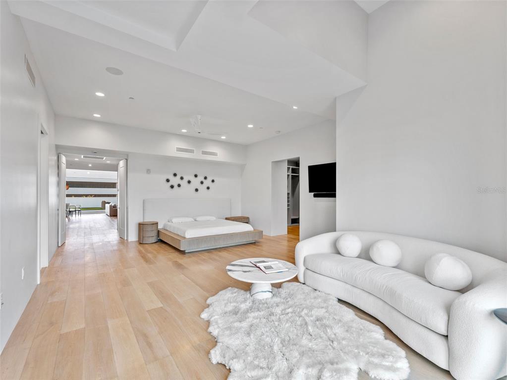 465 Central Avenue, Unit 301 St. Petersburg, FL 33701 - Photo 12 of 47 a living room with furniture and a flat screen tv